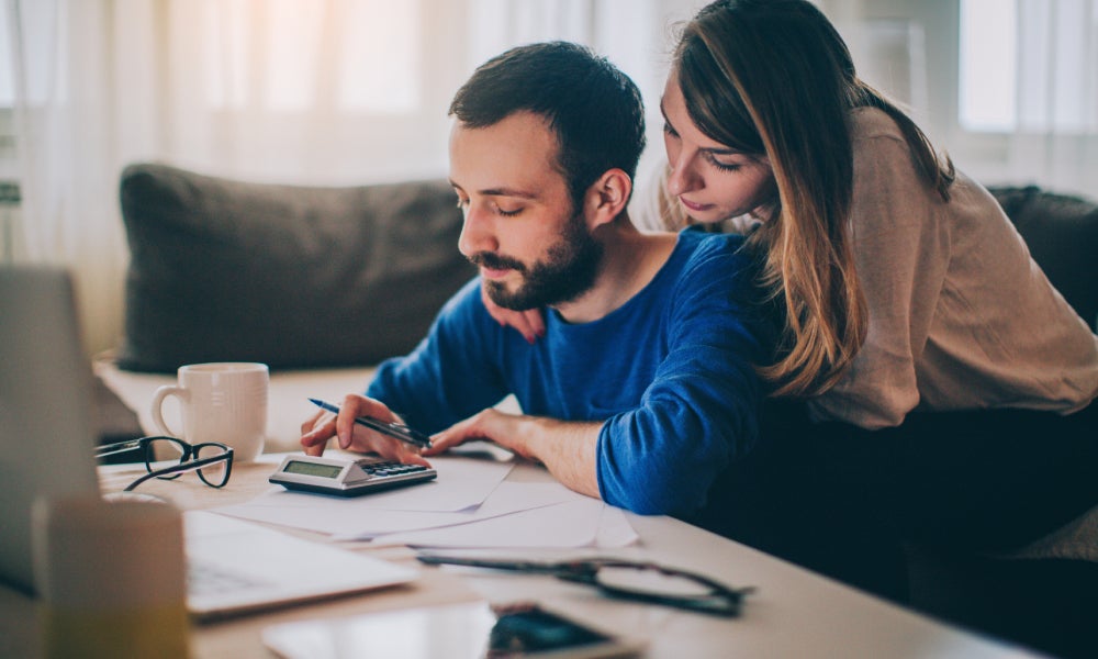 Couple saving home loan bank interest rates.jpg