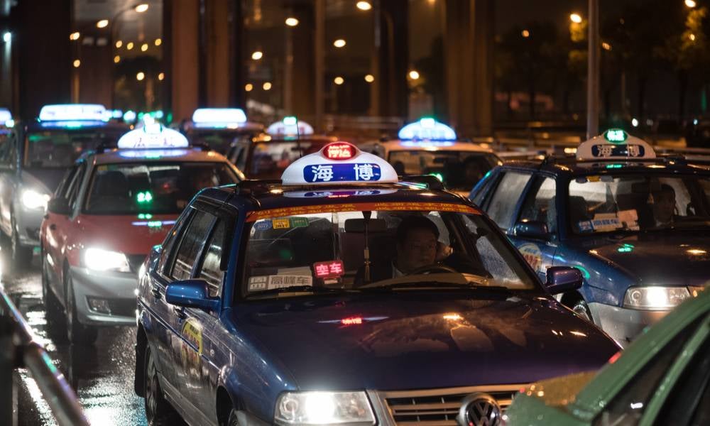 Local businesses like Shangai's oldest taxis service Qiangsheng Taxi have suffered from digital attrition.jpeg