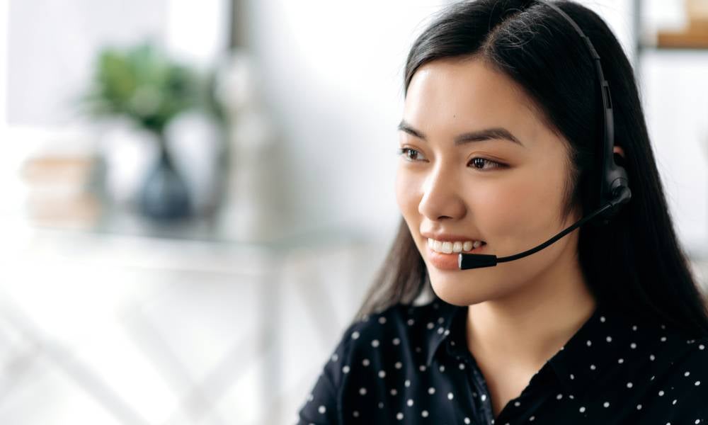 Woman working in customer service role telecommunications.jpeg