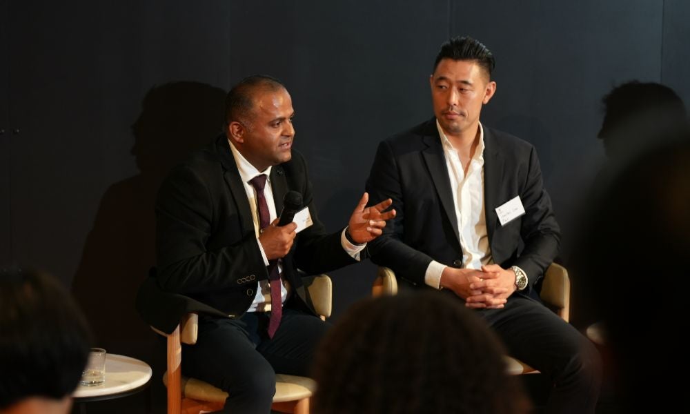 Jay Hira, Director of Cyber Security at KPMG Australia, and Charles Lee, Director of Data and AI at PWC Australia.JPG