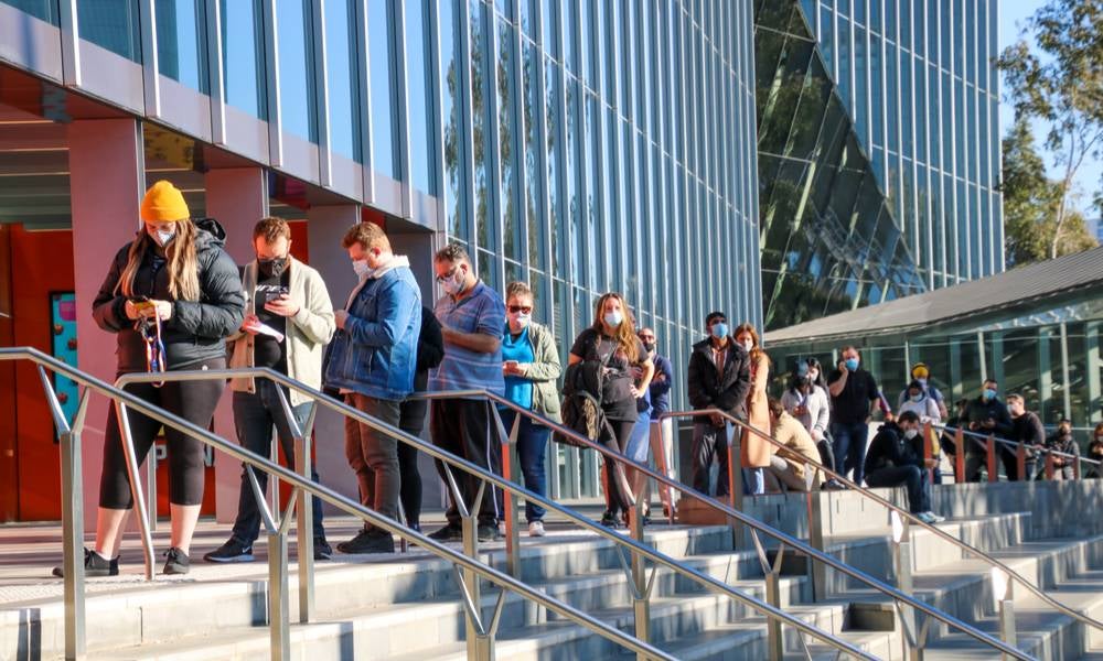 A long queue of people waiting to get vaccinated against covid19 at melbourne convention centre covonavirus vaccination hub..jpg