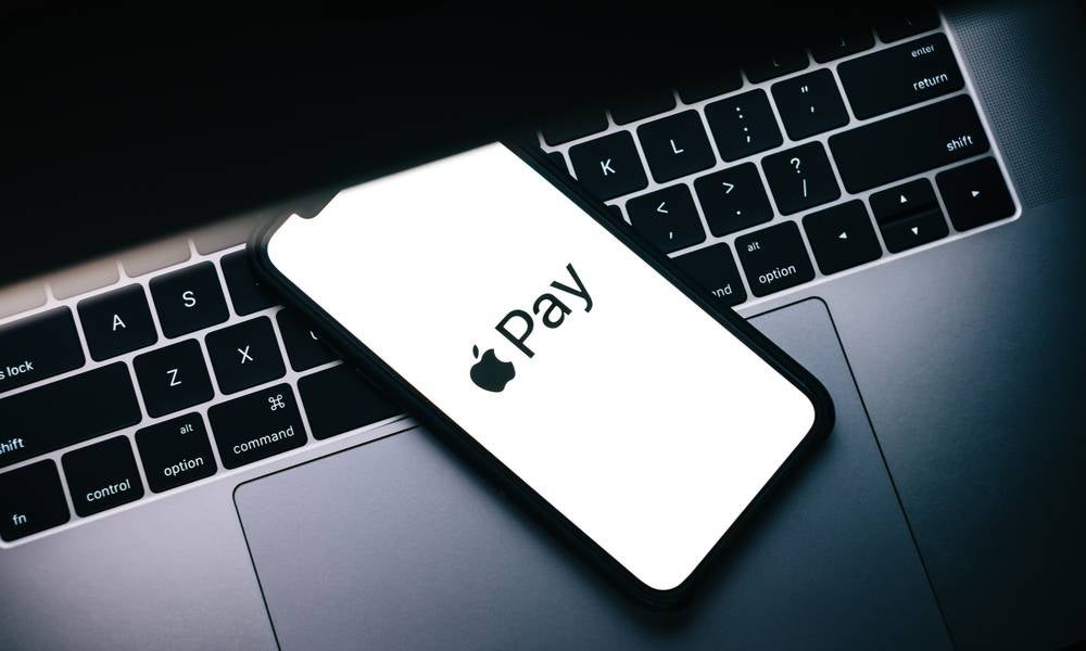 Apple Pay logo on smartphone screen.jpeg
