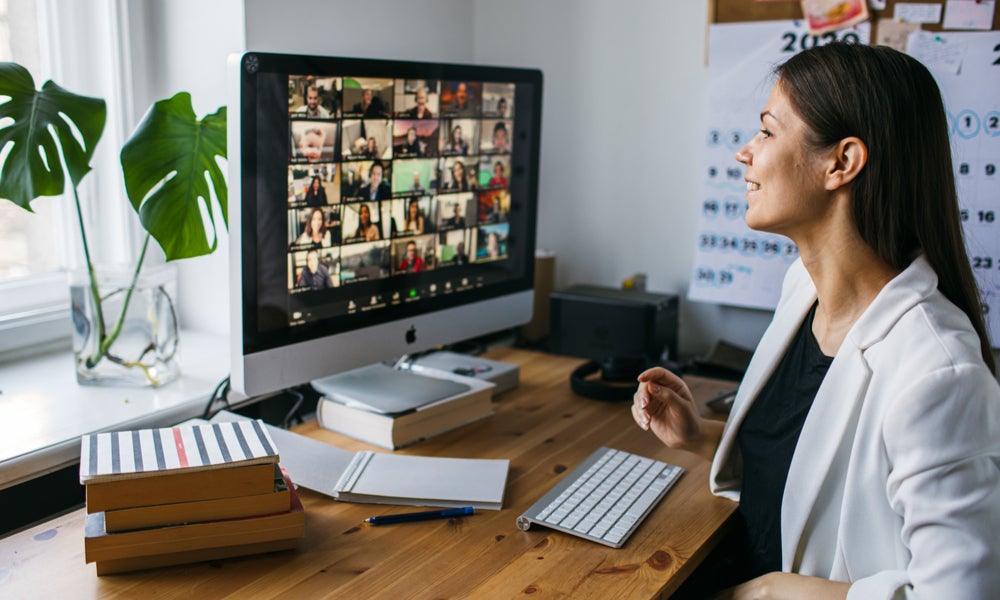 Woman working computer zoom call-min.jpg