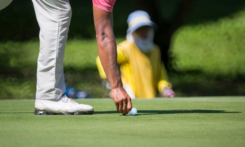 “Put your ball marker upside down” – a nudge from Professor Richard Thaler for golfers who want to avoid a two-stroke penalty.jpeg