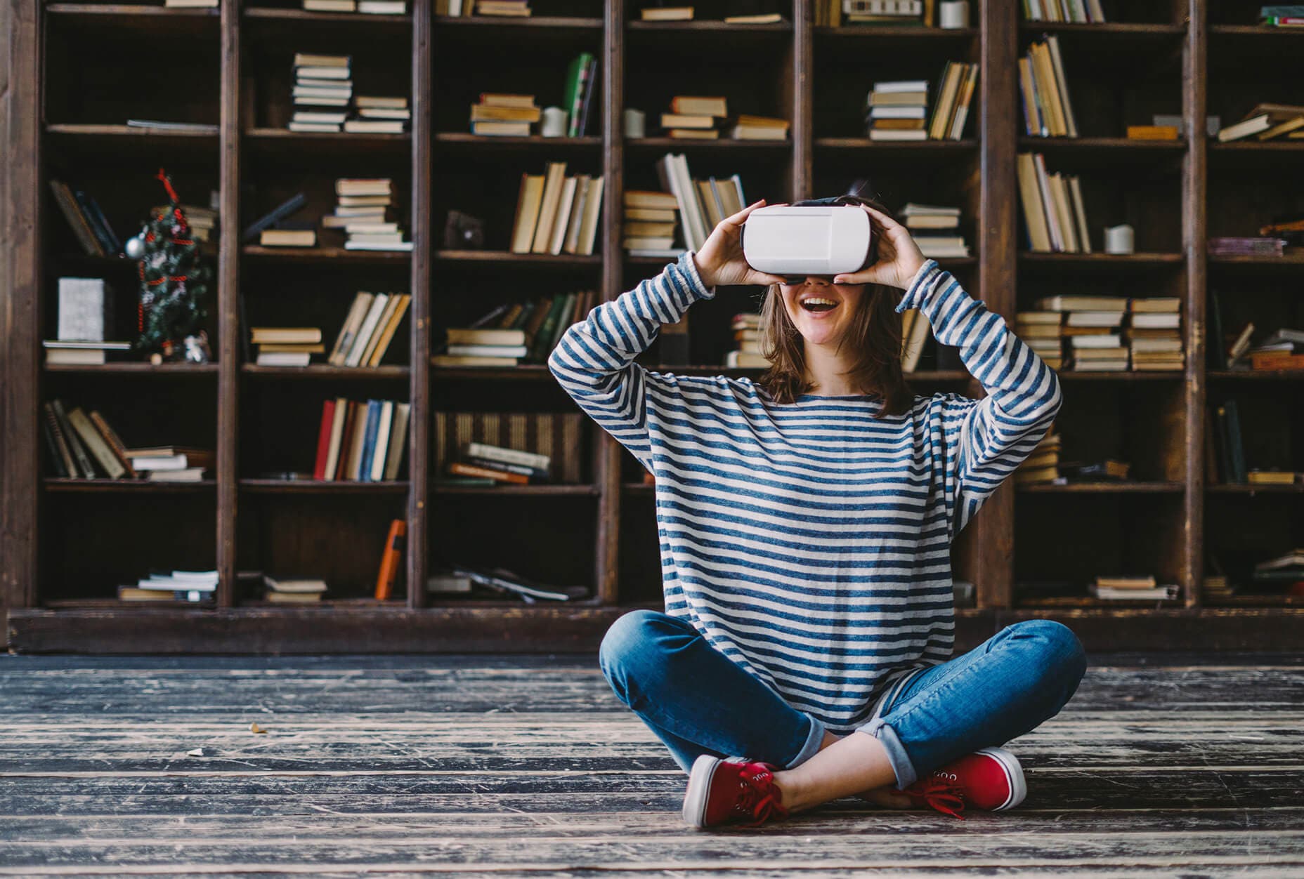 Young woman exploring the world of omnichannel with VR