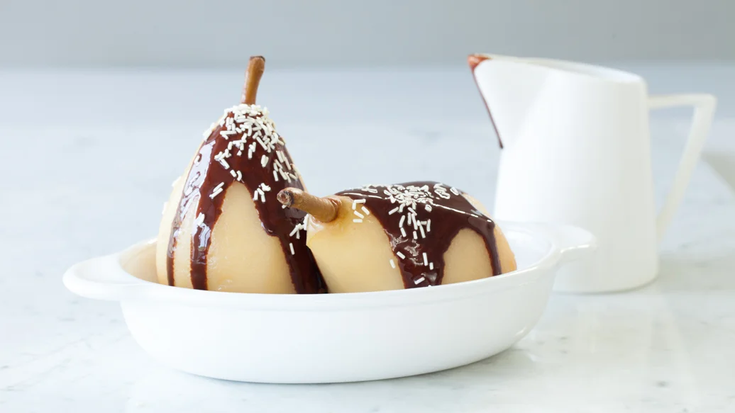 Pears Poached in Mulling Spices with Chocolate Sauce