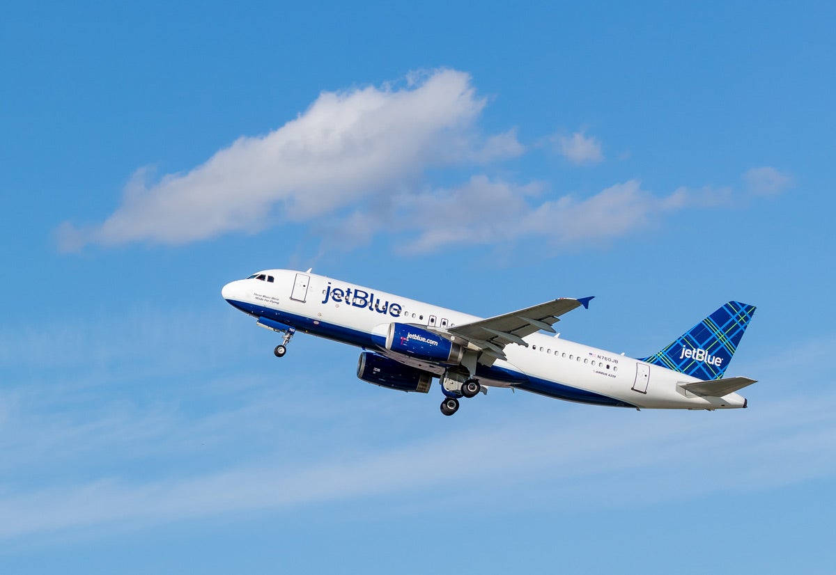 jet blue airplane during takeoff