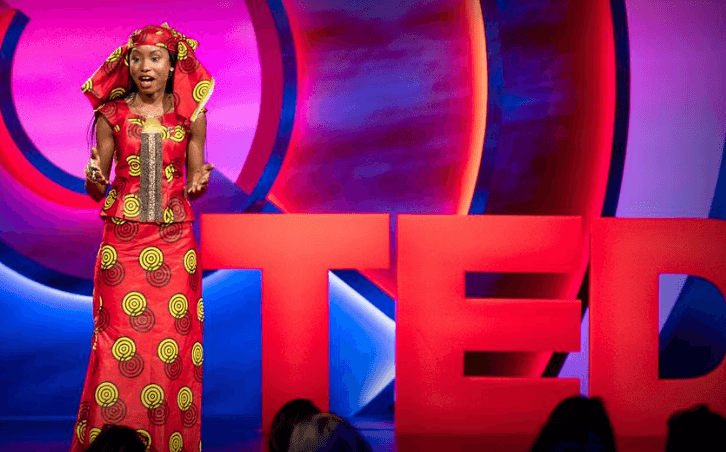 Person on stage at TED talk