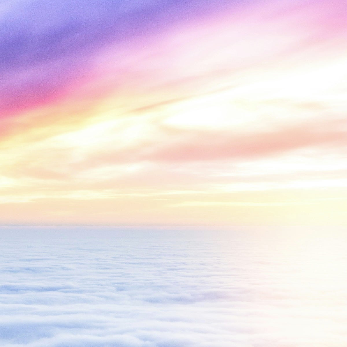 A pastel sunset over clouds