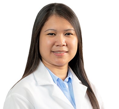 Dr. Kristy Nguyen in a white coat