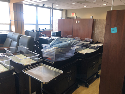 Image of hospital furniture and equipment ready for donating.