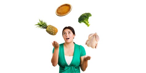 Girl juggling healthy and unhealthy foods