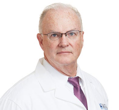 Headshot of Dr. Terry Wilsdorf in white jacket