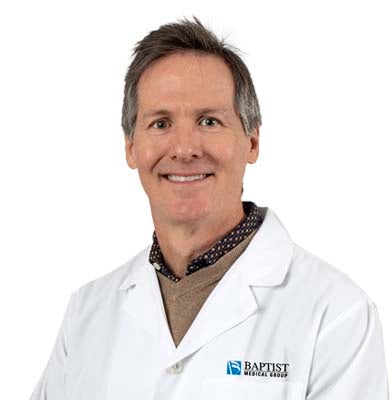 Headshot of Dr. Marc Boyd in white coat.