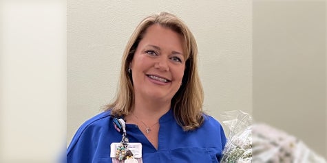 Baptist nurse Mindy Hodges is honored with a DAISY Award.