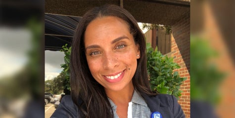 Erica Reed Baptist Health Care Team Member smiling outdoors