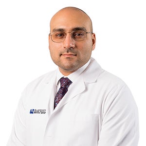 Dr. Mark Sahawneh in white jacket