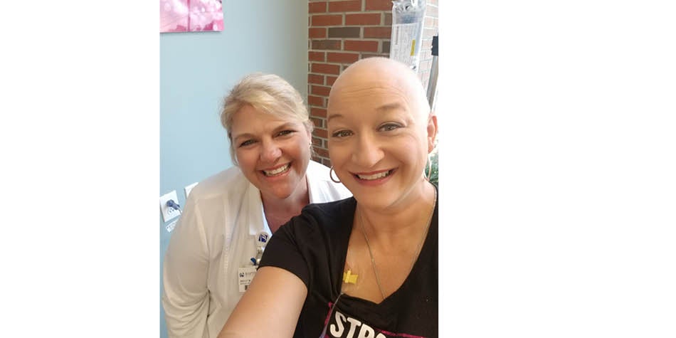 Nurse navigator Kelly supports Rachel during her last chemo treatment