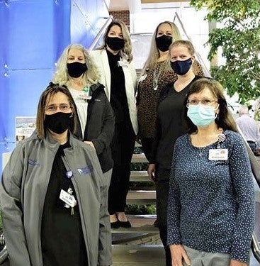 Microbiology team pictured wearing masks 