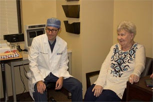 Dr. Thomas Babcock and Joanne Kish, cochlear implant patient