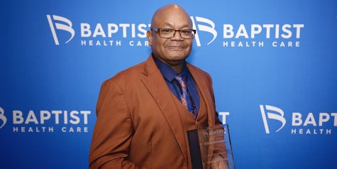 Willie Johnson is awarded the 2024 volunteer of the year through Baptist Health Care Foundation Hollinger Awards.