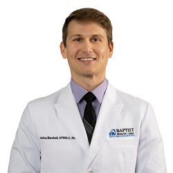 Nurse practitioner Joshua Marshall APRN in white BHC coat