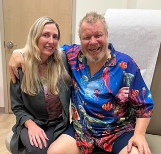 Dr. Janelle Bennett with BMG Hematology and Oncology with patient Wesley