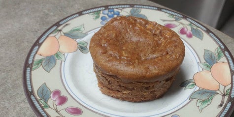 Peanut butter and apple flavored muffin on a serving plate