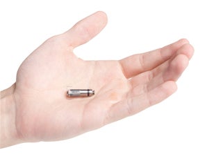 Hand holding world's smallest pacemaker