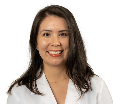 Head and shoulders photo of Sarah Gaudiosi in white coat.