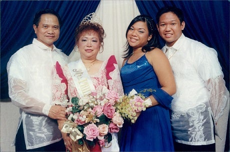 Krystle Fernandez, pictured third from left is with her father, mother and brother after mom is crowned Mrs. Philippines of Northwest Florida.