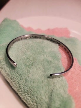 Bariatric bracelet that Vickie wears explaining that she had the bariatric surgery, a symbol of knowledge and empowerment