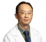 Dr. Li in white coat