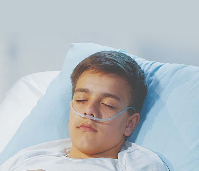 boy in hospital bed
