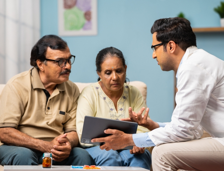 Doctor talking with patient