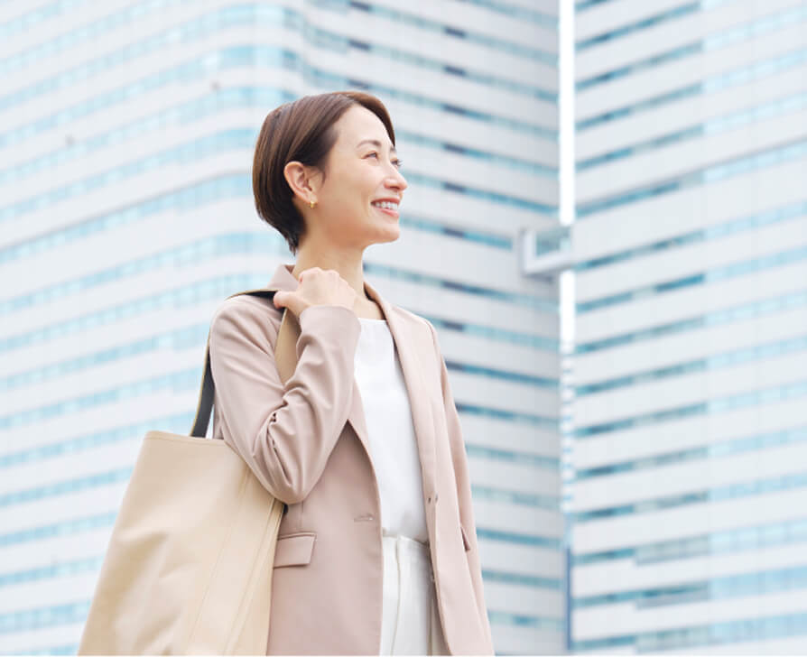 Women in coat smiling