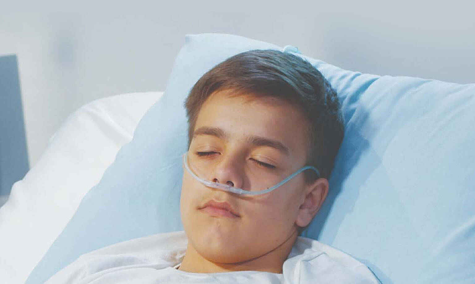 boy in hospital bed