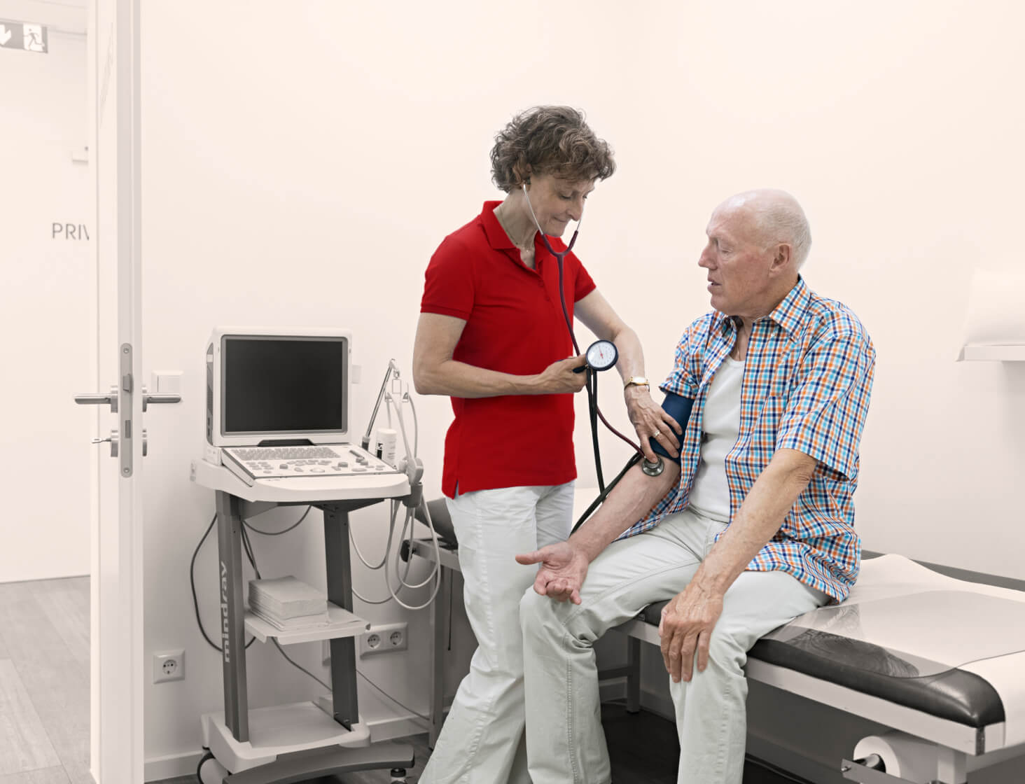 Patient having blood pressure taken