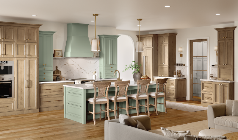 Maple wood kitchen cabinets with a mix of painted and stained finishes.