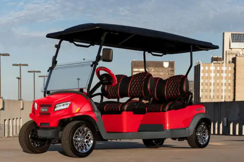 A bright red Club Car special edition 
