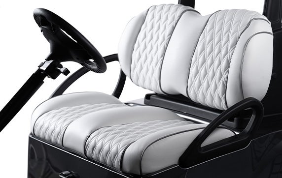 Premium golf cart seats in white with silver diamond stitching