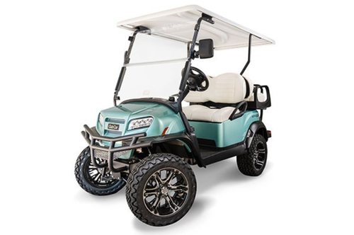 A Seafoam-colored Club Car golf cart