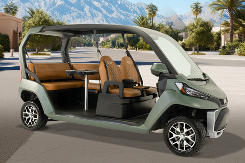 A sage green Club Car CRU parked outside