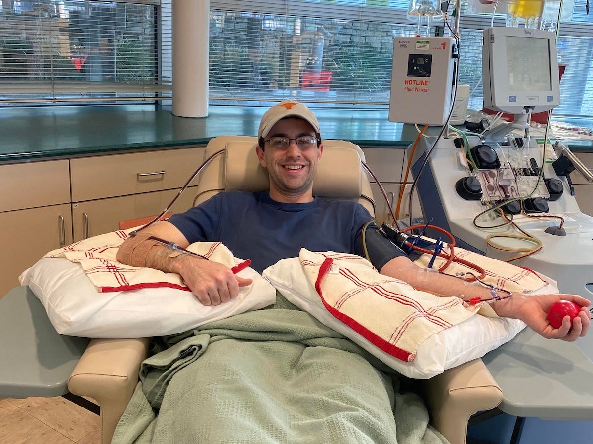 William is all smiles as he donates blood stem cells.