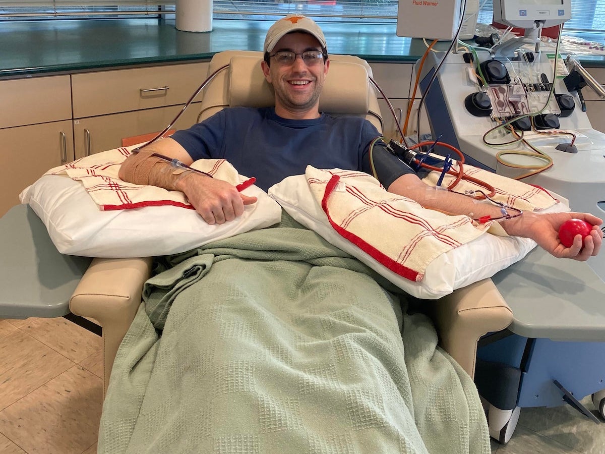 William is all smiles as he donates blood stem cells.