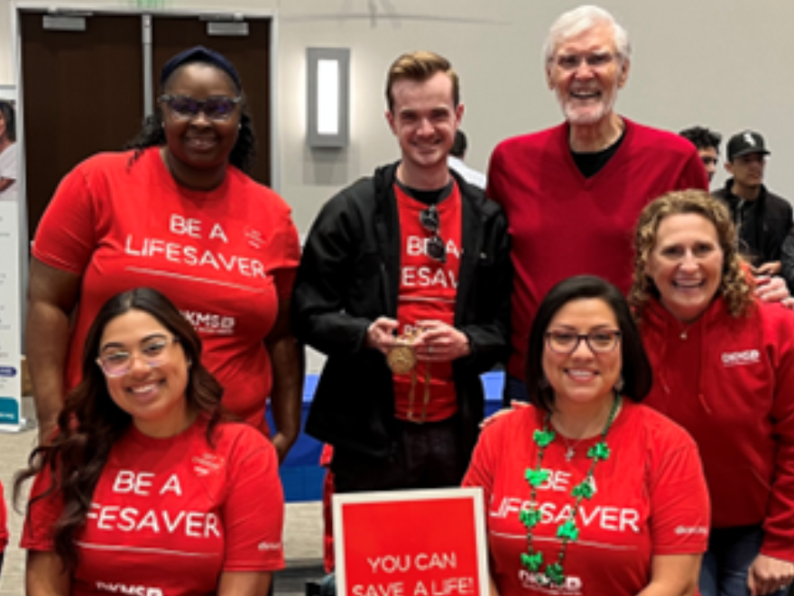 Earl Young's Team with DKMS staff and volunteers at a blood stem cell registration drive Earl Young's Team with DKMS staff and volunteers at a blood stem cell registration drive