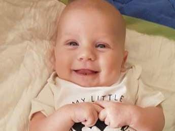 Baby Michael smiling. Baby Michael smiling.