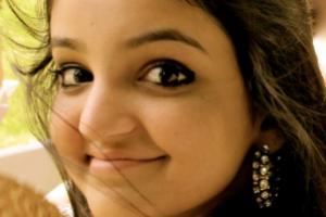 Aisha Chaudhary smiling 