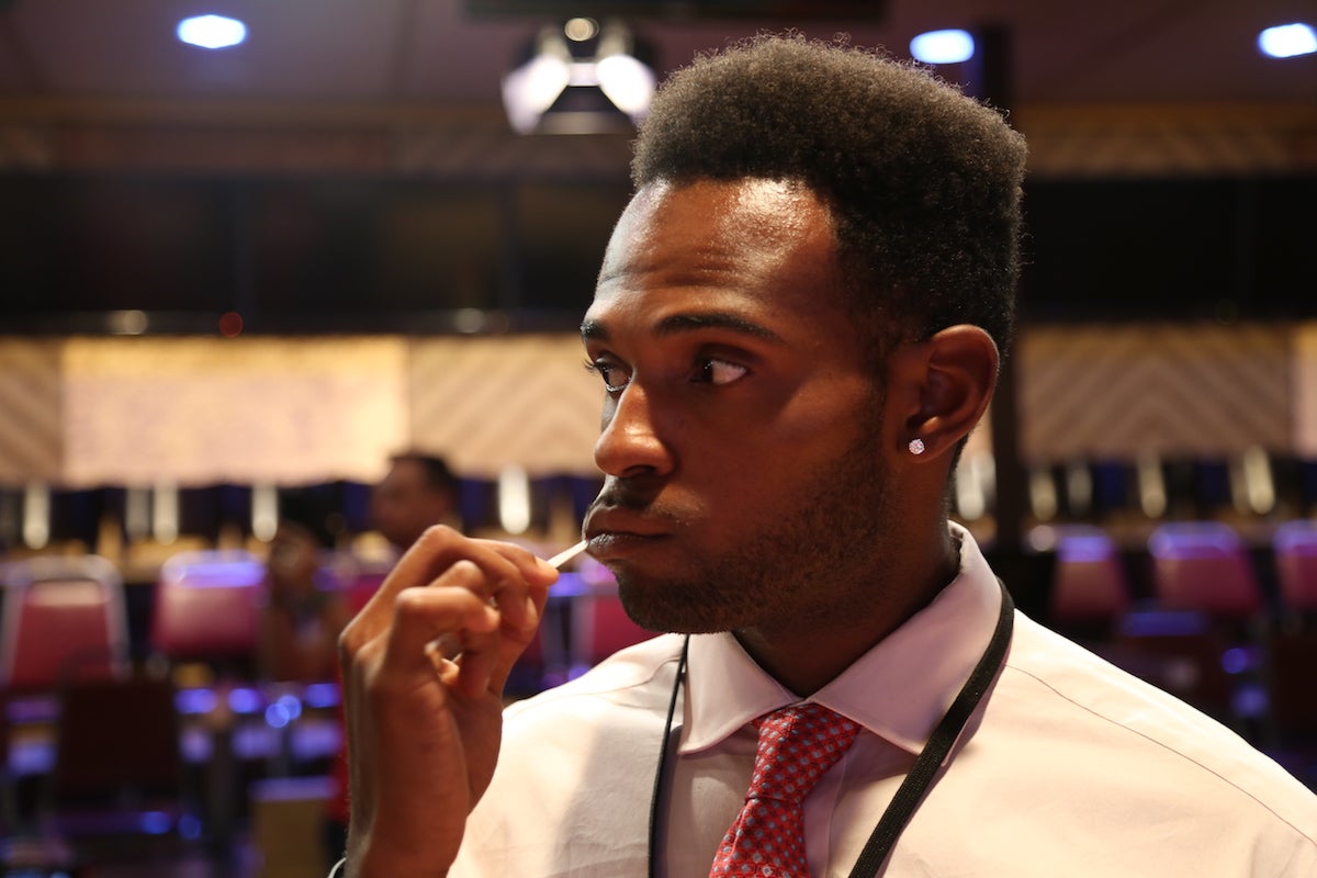 Man swabbing cheeks DKMS Man swabbing cheeks DKMS