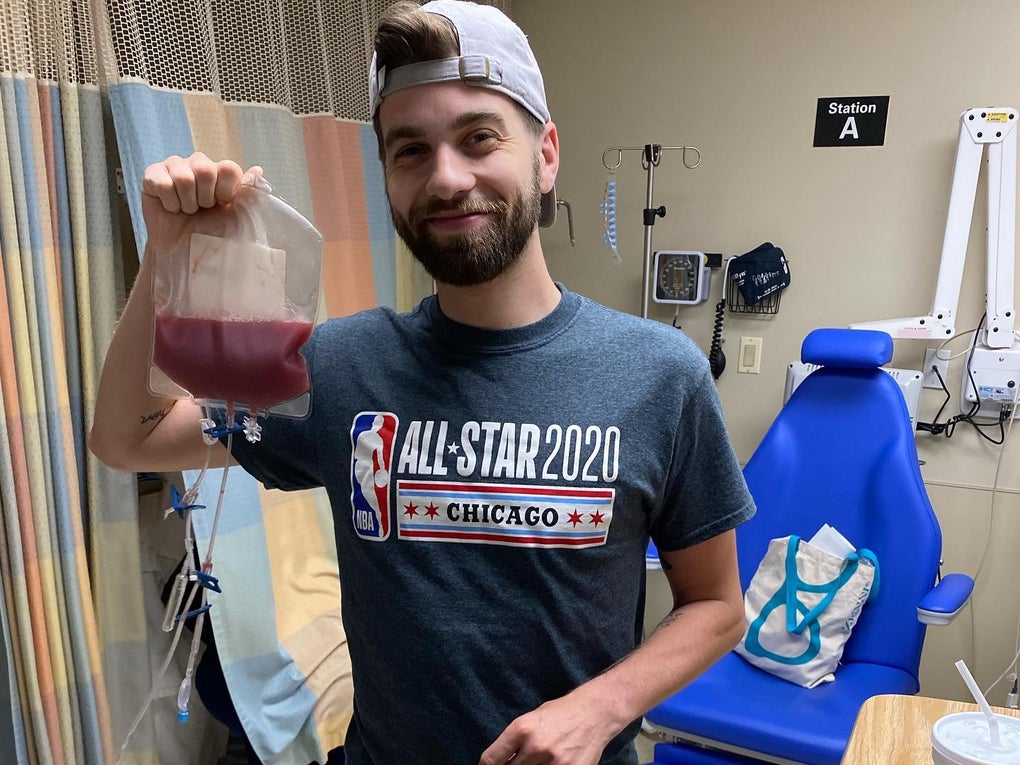 Ransom donor holding blood bag Ransom donor holding blood bag
